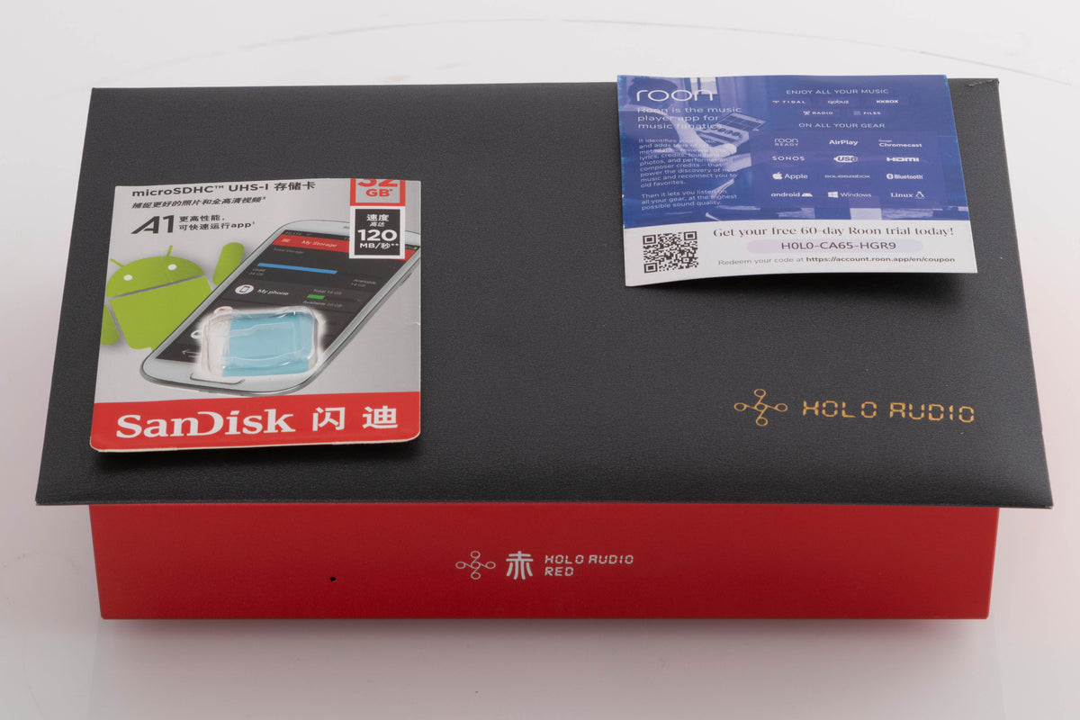 Top of a used Holo Audio Red Network Streamer in a Red finish showing Manual