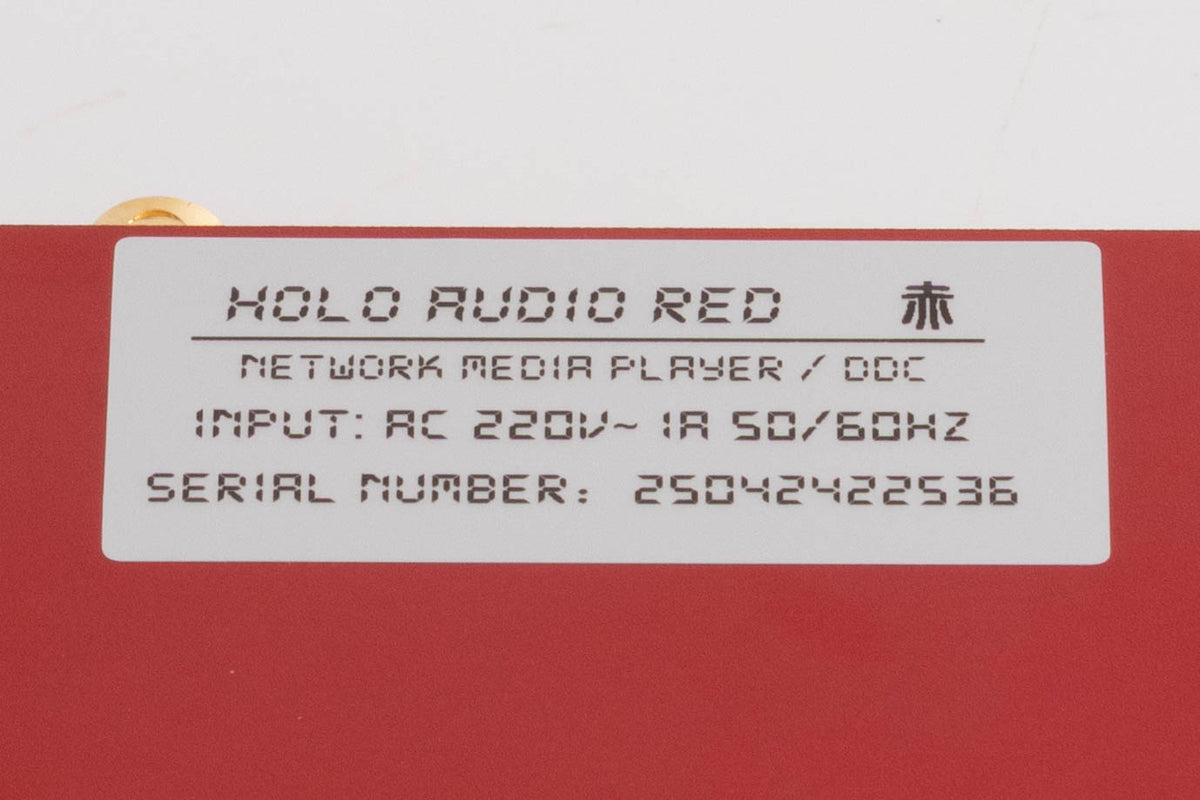 Close up of a used Holo Audio Red Network Streamer in a Red finish showing serial number