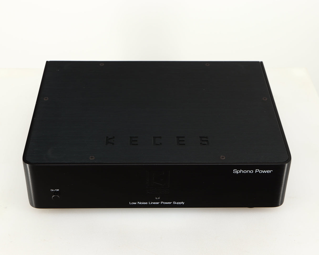 Top of a used Keces Sphono Power Supply in a black finish