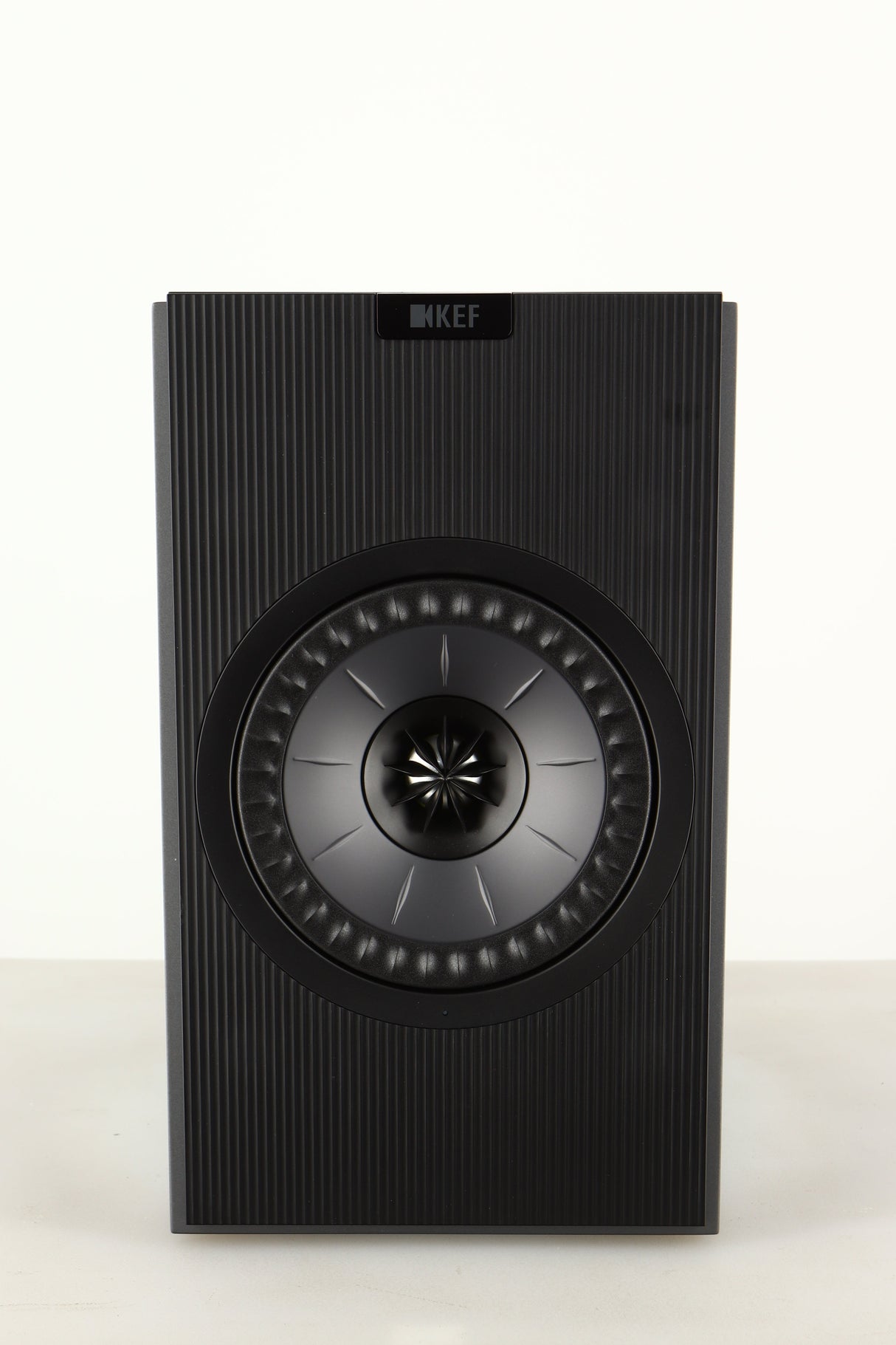 Front view of a used KEF Coda W Active Standmount Speaker in Dark Titanium finish