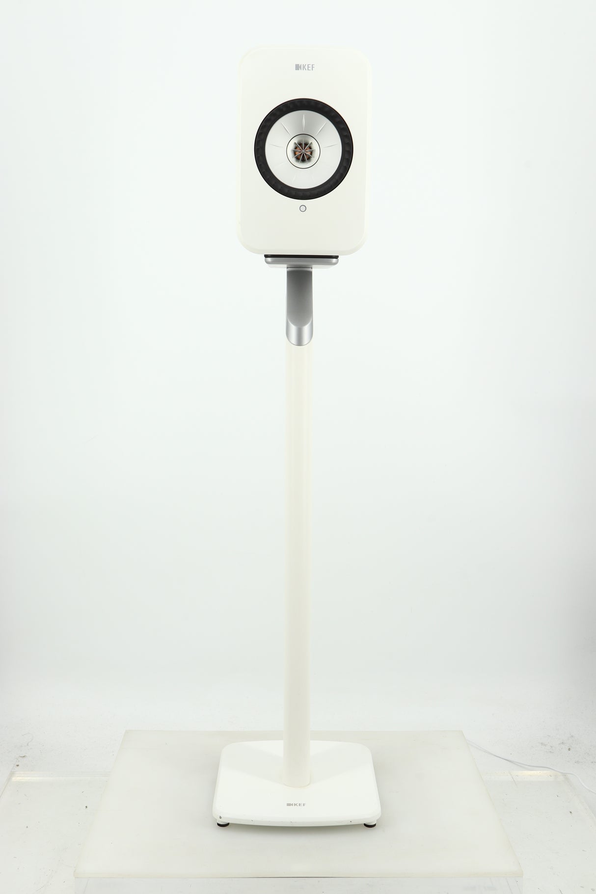 Front view of a used KEF LSX Standmount Speaker W/ Stand in a white finish