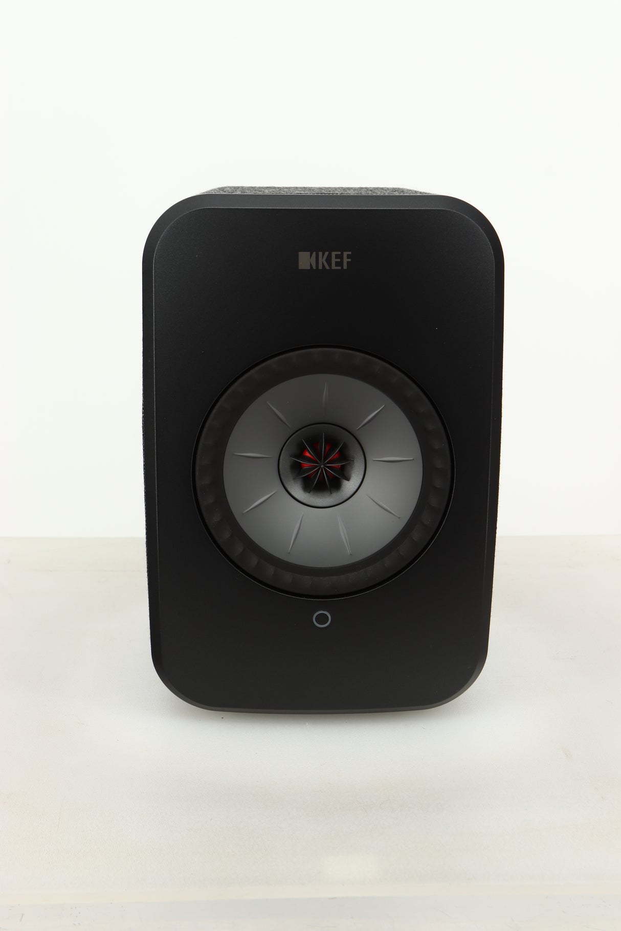 Front view of a KEF LSX Wireless Standmount Speaker in Black finish