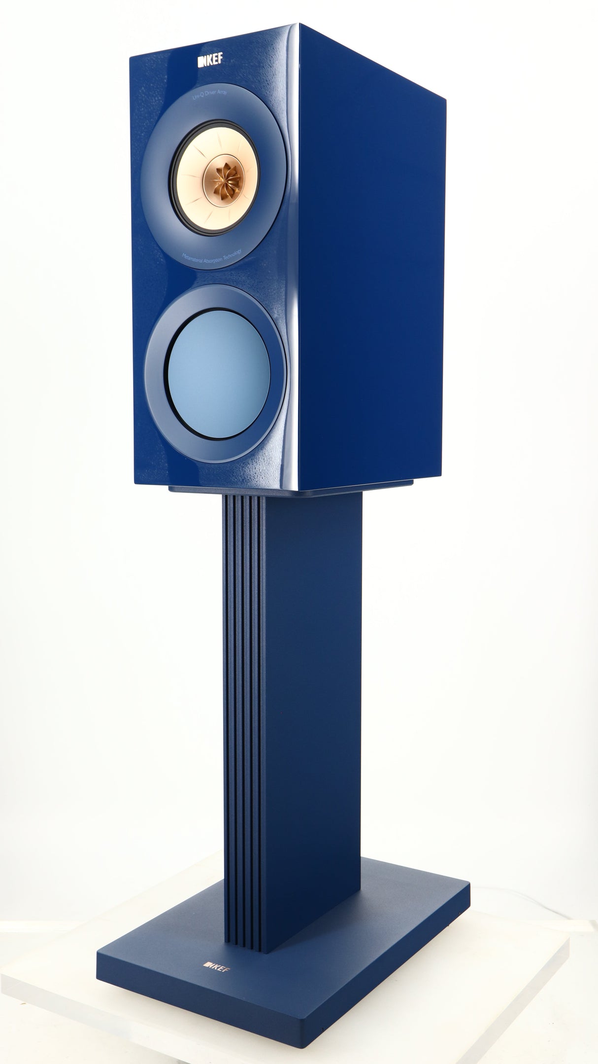 Front right corner of a used KEF R3 META Standmount Speaker W/ Stand in an indigo gloss finish