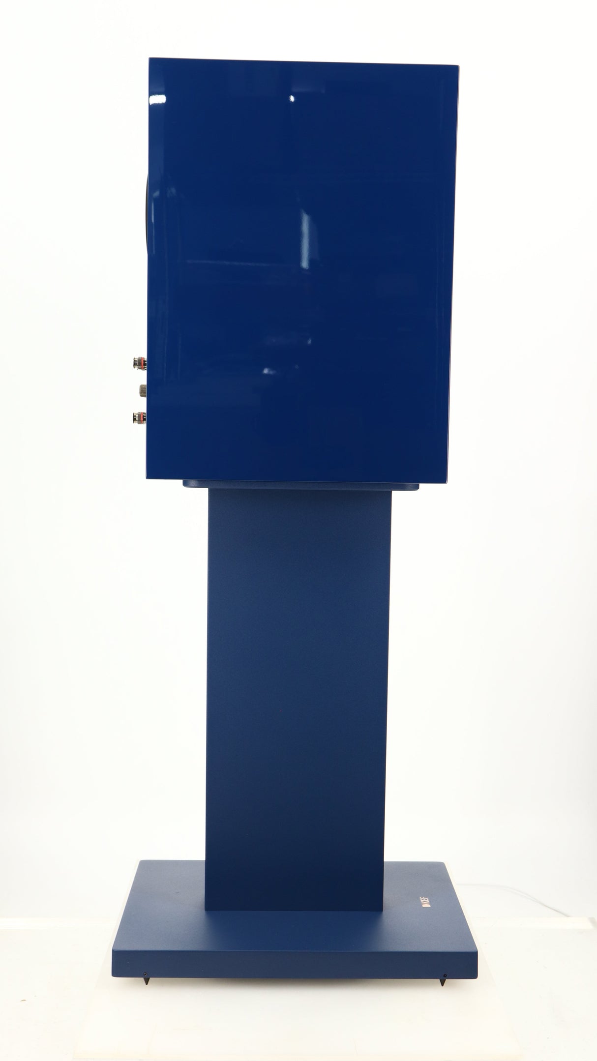 Left side view of a used KEF R3 META Standmount Speaker W/ Stand in an indigo gloss finish
