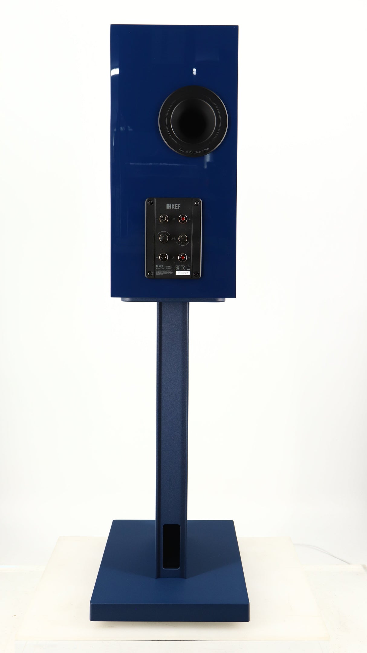 Rear view of a used KEF R3 META Standmount Speaker W/ Stand in an indigo gloss finish