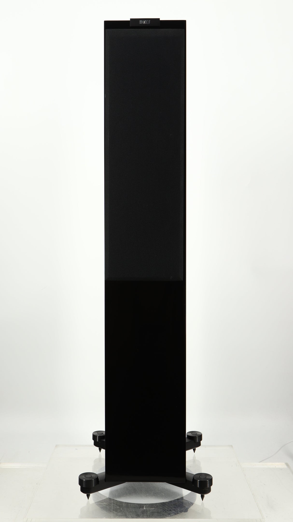 Front view of a used KEF R500 Floorstanding Speaker in a gloss black finish showing grille
