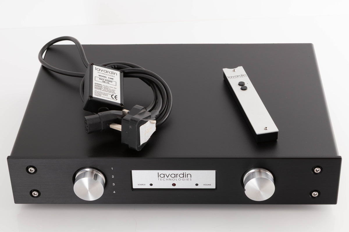 Top of a used Lavardin ISX Integrated Amplifier W/ Remote in a Black finish showing Mains Cable and Remote