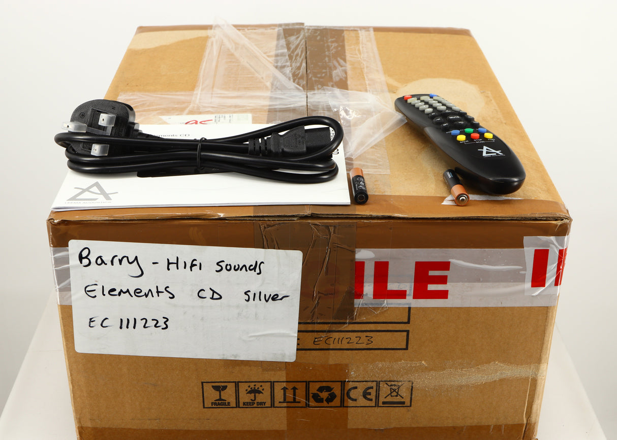 Box for a used Leema Acoustics Elements CD Player in a silver finish showing Mains Cable, Remote, 2x Batteries and Manual