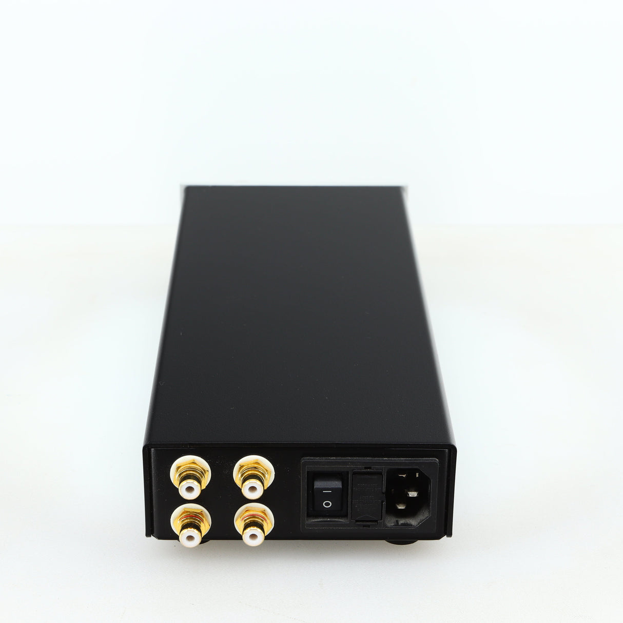 Rear view of a used Lehmann Black Cube Linear Headphone Amplifier in a silver finish showing Phono Inputs