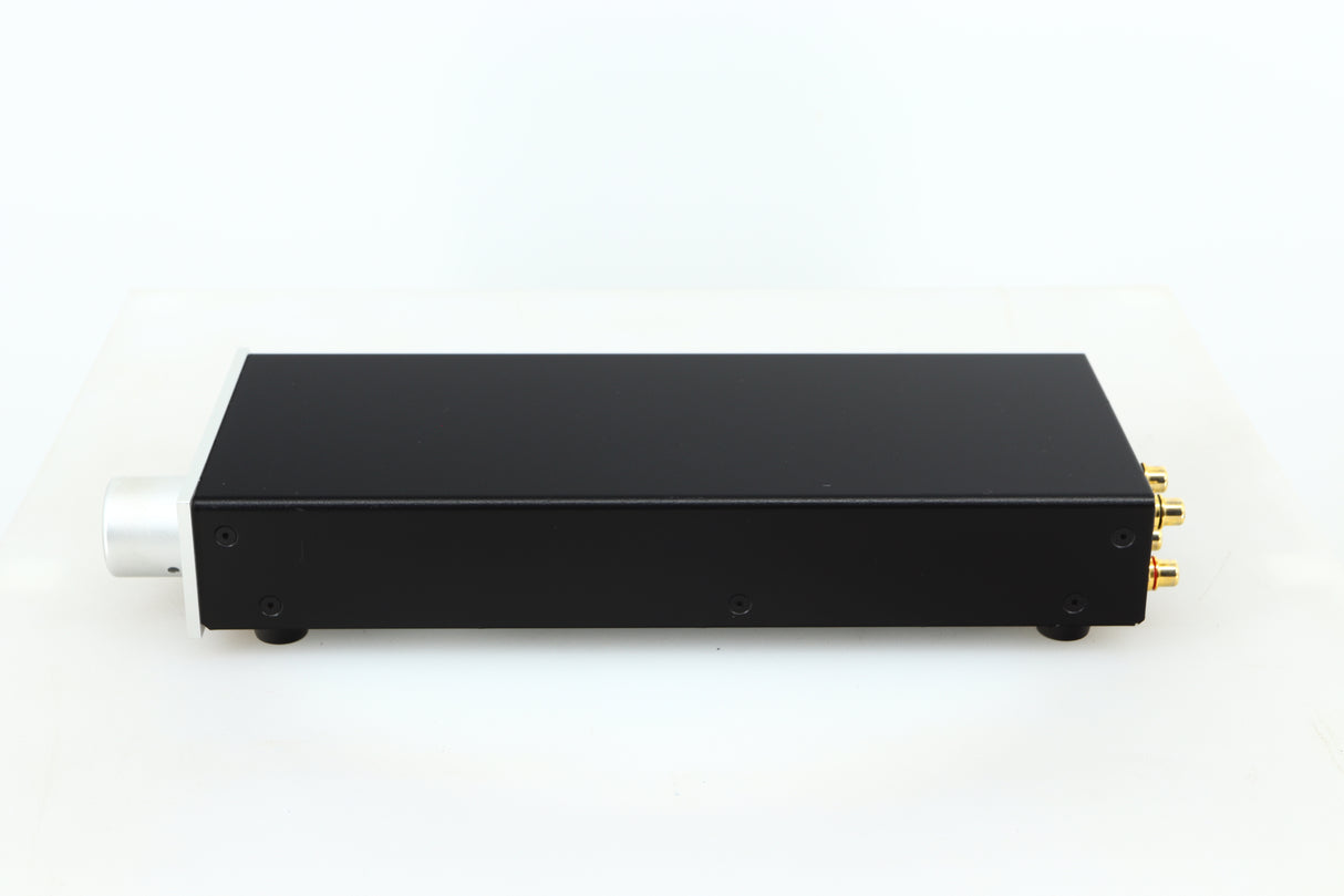Right side view of a used Lehmann Black Cube Linear Headphone Amplifier in a silver finish