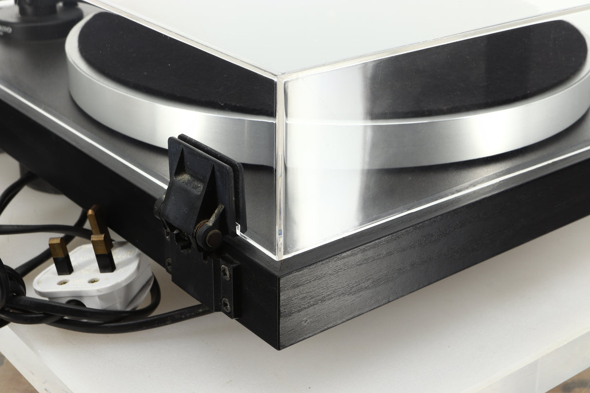 Rear left corner of a used Linn Basik Turntable / Akito Tonearm in a black finish