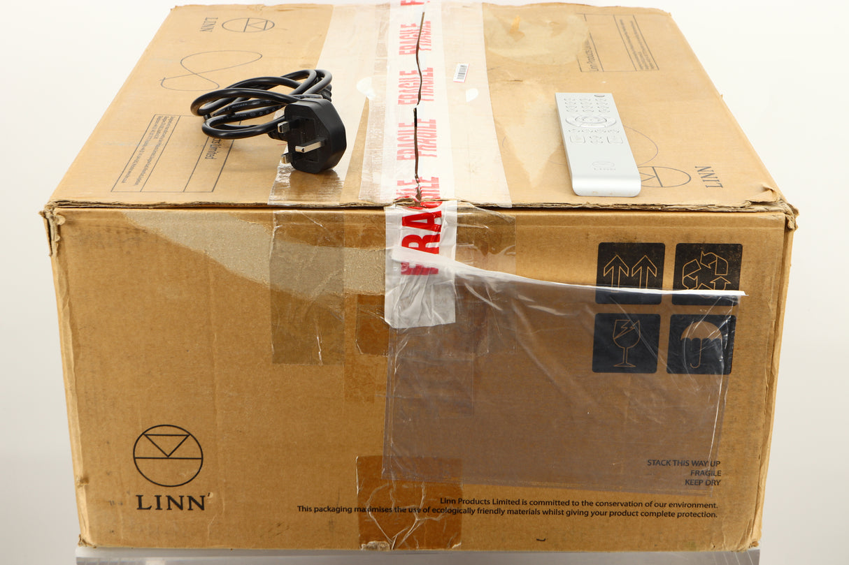 Box of a used Linn Klimax Exakt DSM System Hub showing mains cable, and remote