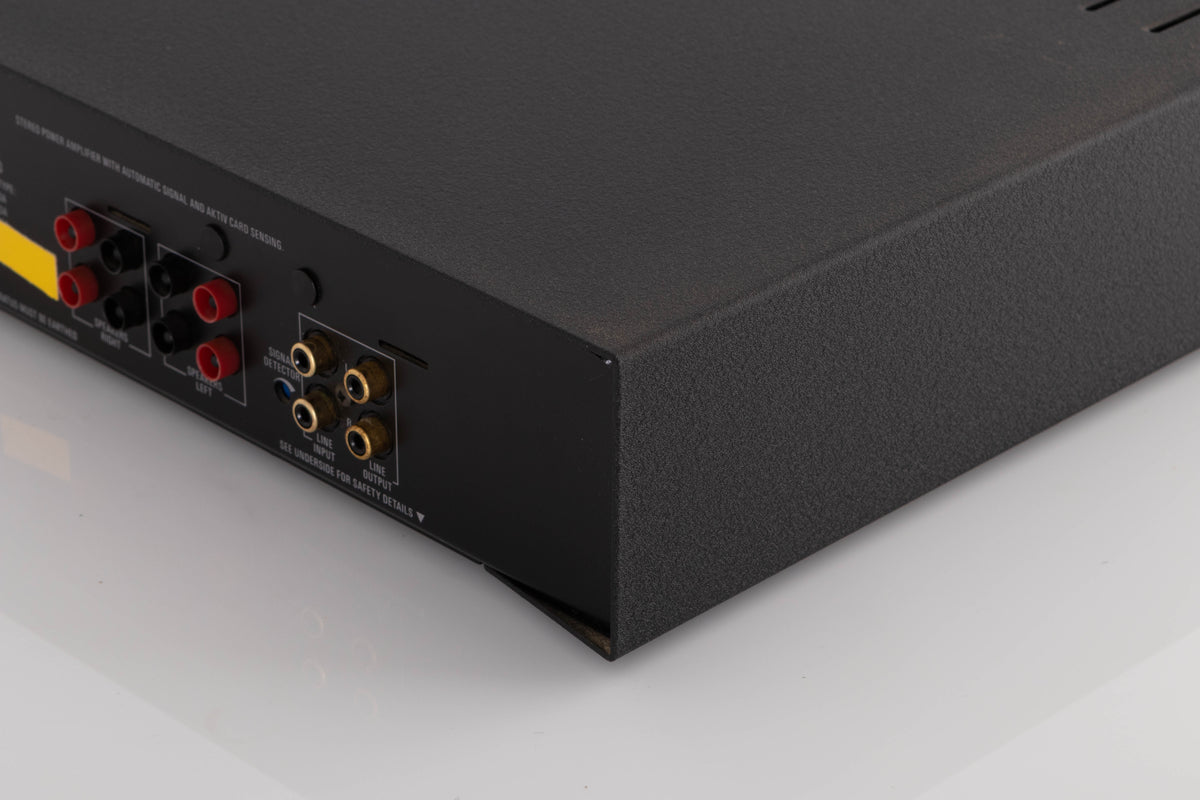 Rear left corner of a used Linn LK85 Power Amplifier in a Black finish