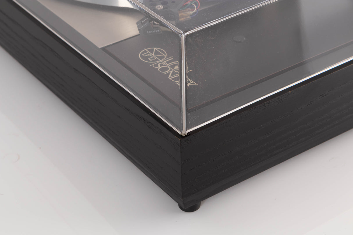 Front right corner of a used Linn LP12 Turntable / Basik Plus Tonearm / K-9 Cartridge in a Black Ash finish