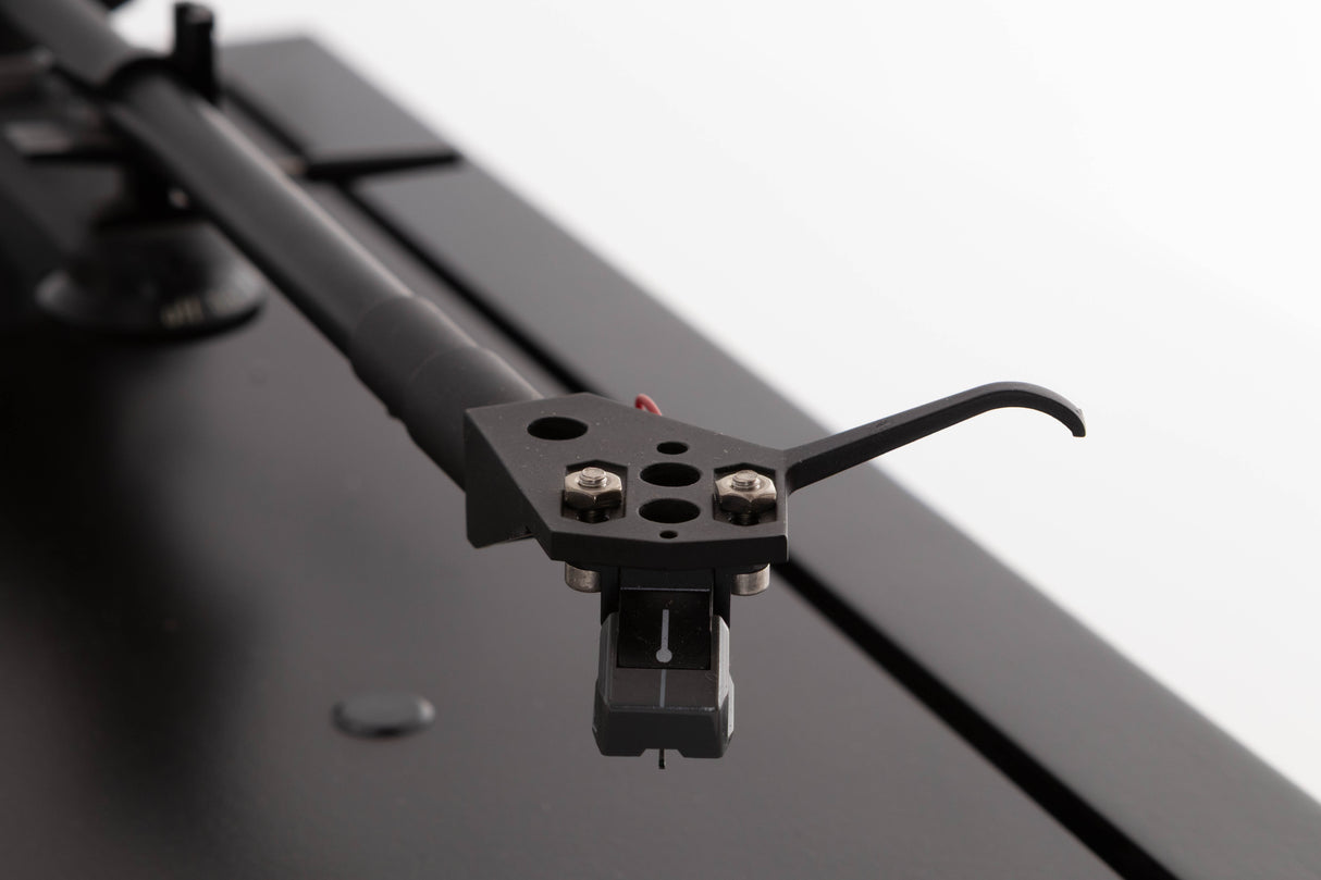 Close up of a used Linn LP12 Turntable / Basik Plus Tonearm / K-9 Cartridge in a Black Ash finish showing stylus