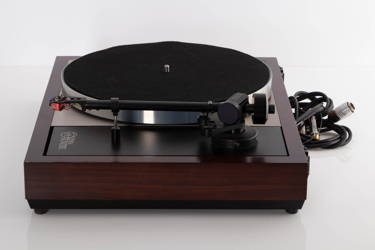 Side view of a used Linn LP12 Turntable with Black Ittok Tonearm and Troika Cartridge