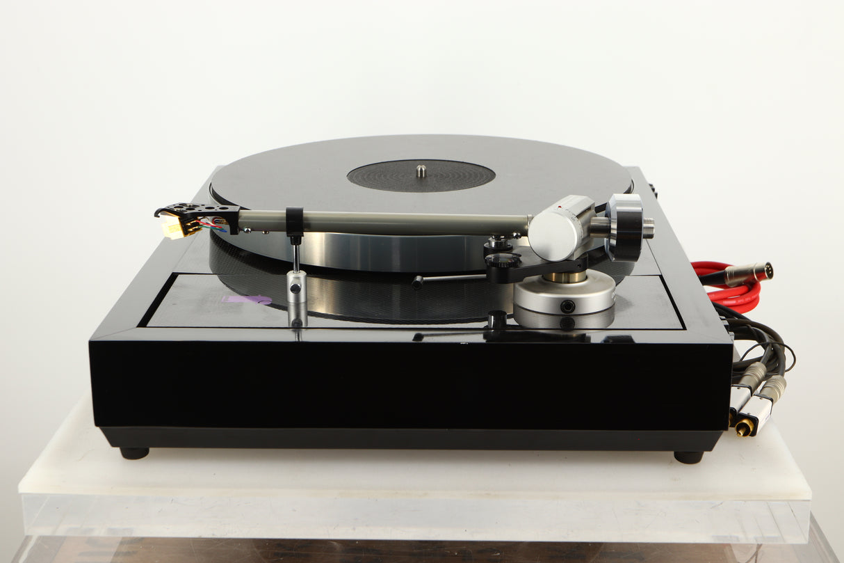 Side view of a Linn LP12 Turntable in Black Gloss finish with Funk Firm Vector Link Upgrade, Ittok Tonearm, and Dynavector Karat D17D3 Cartridge