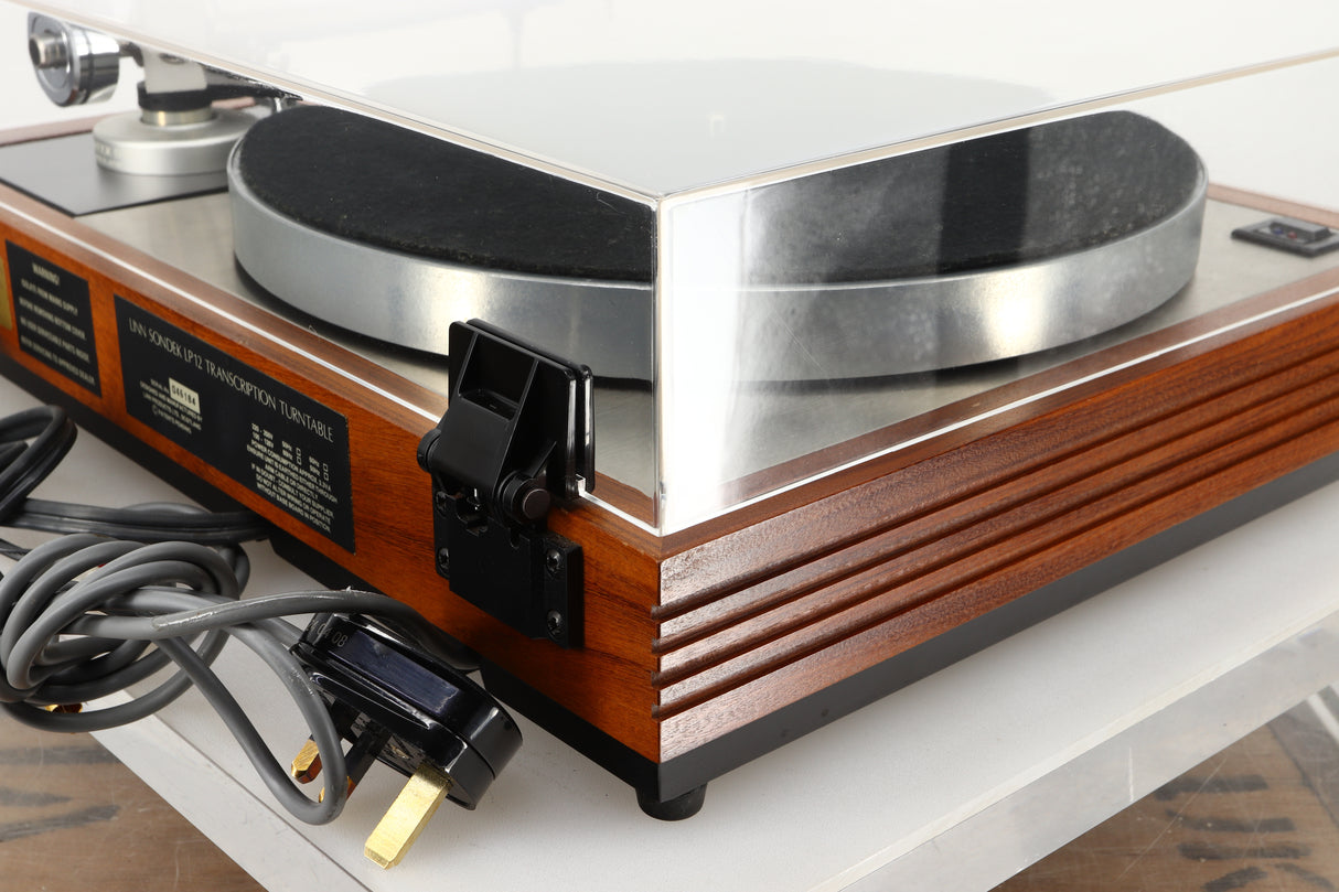 Rear left corner of a used Linn LP12 Turntable / Ittok Tonearm / Hercules Power Supply in a afromosia finish