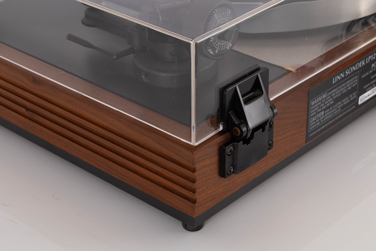Rear left corner view of a used Linn LP12 Turntable in Afromosia with Akito Tonearm and Adikt Cartridge