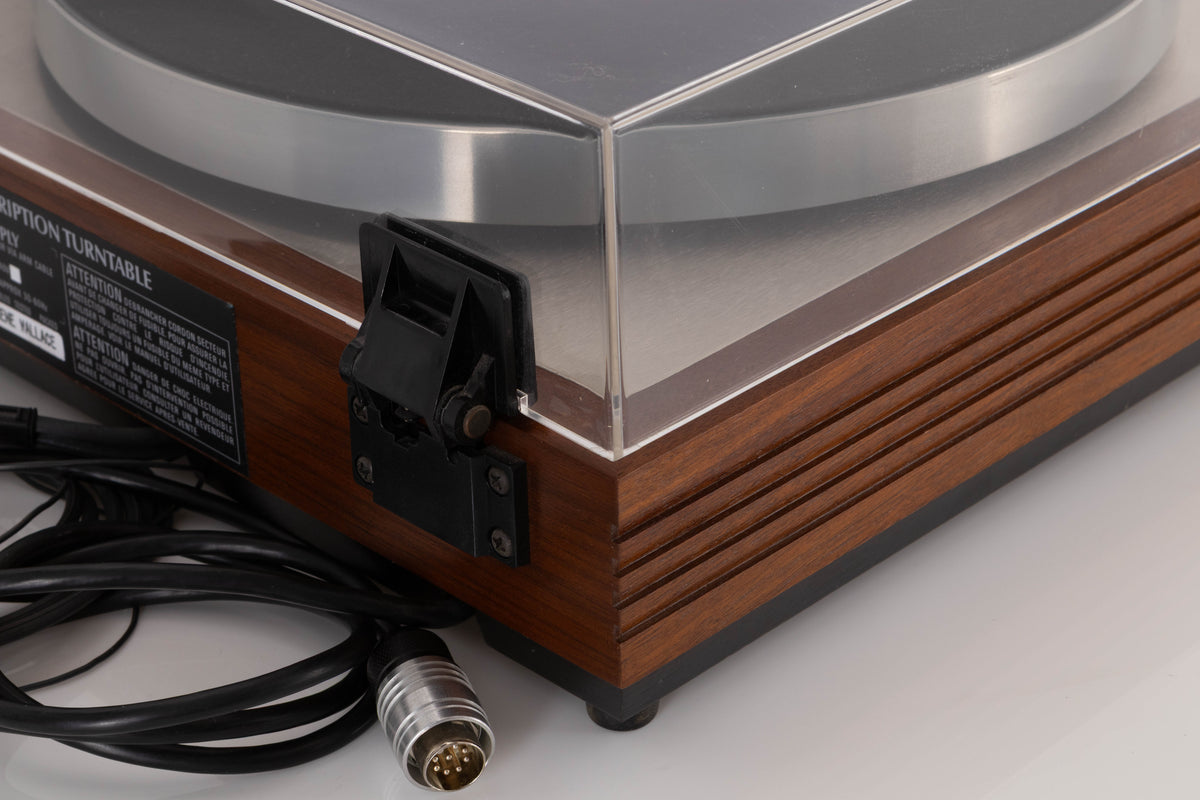 Rear right corner view of a used Linn LP12 Turntable in Afromosia with Akito Tonearm and Adikt Cartridge