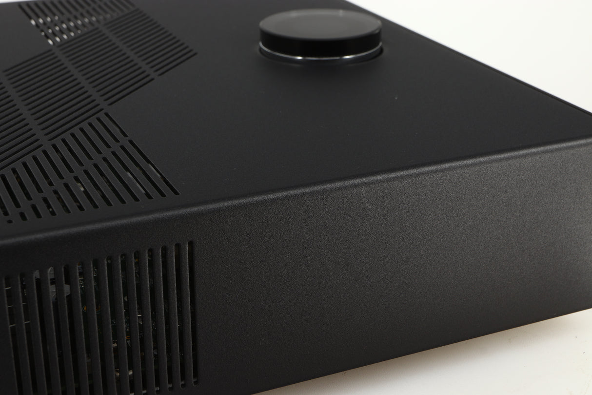Close up of a used Linn Majik DSM5 Network Music System in a black finish showing light scratch on left side