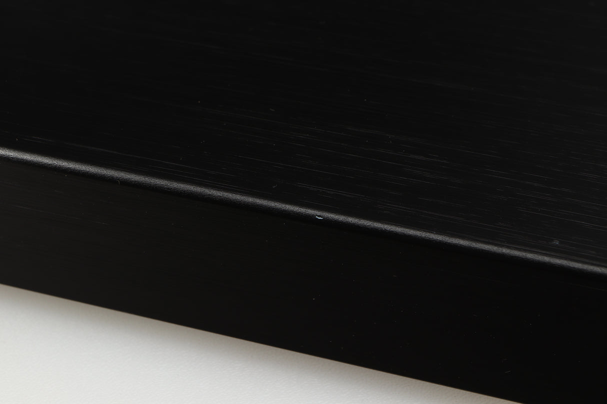 Close up of a used Lumin D2 Network Streamer in a black finish showing tiny nick on left side