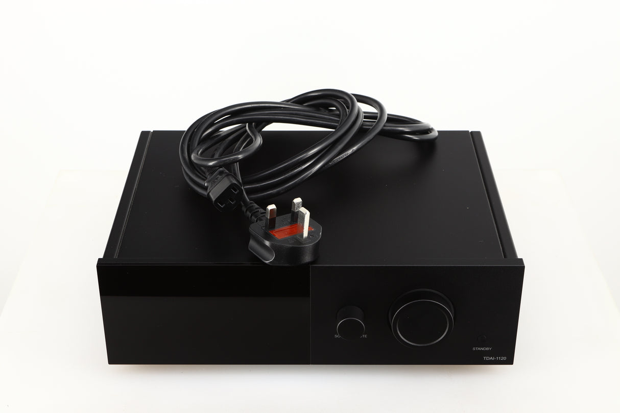 Top of a used Lyngdorf TDAI-1120 Integrated Streaming System in a black finish showing Mains Cable