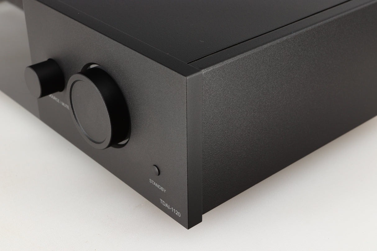 Front right corner of a used Lyngdorf TDAI-1120 Integrated Streaming System in a black finish