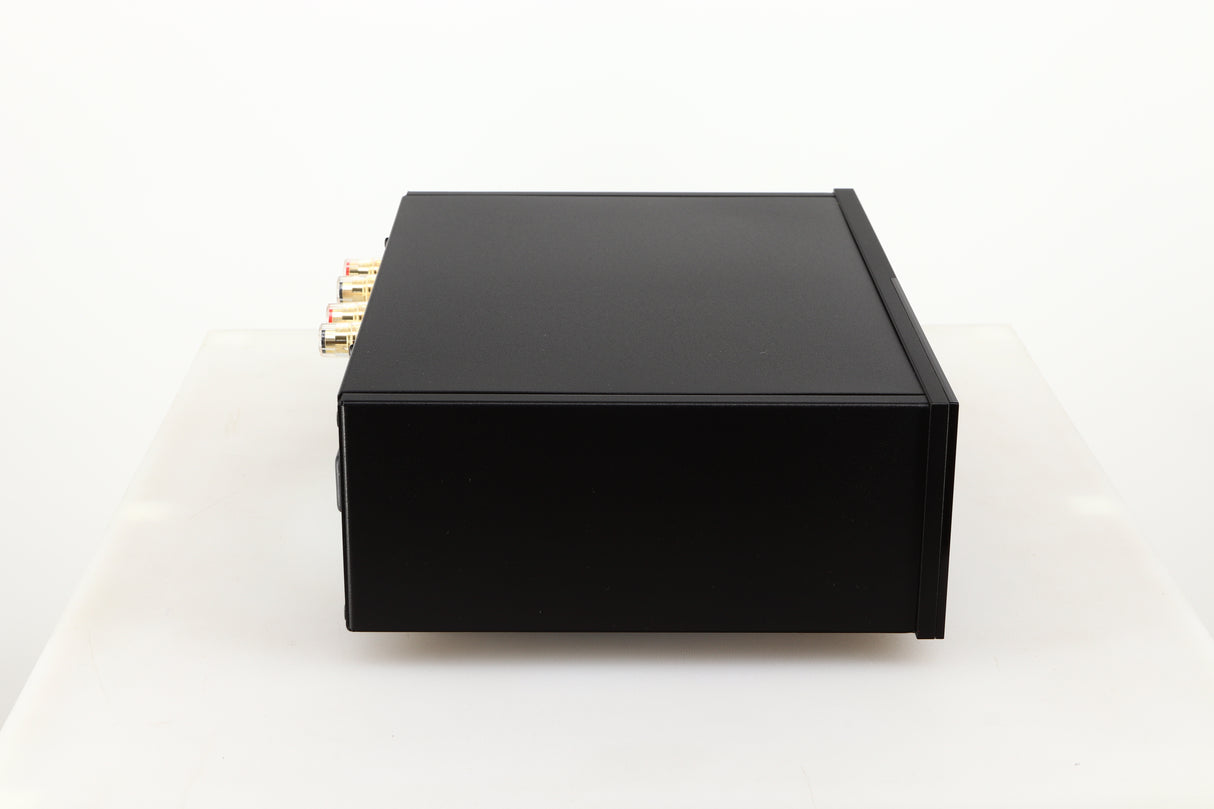 Left side view of a used Lyngdorf TDAI-1120 Integrated Streaming System in a black finish