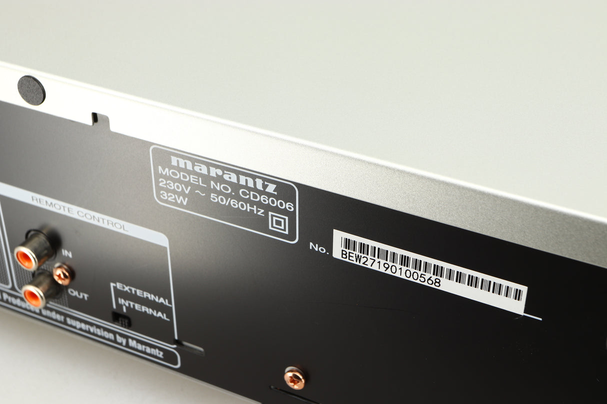 Close up of a used Marantz CD6006 UK Edition CD Player in a silver finish showing some scratches on rear