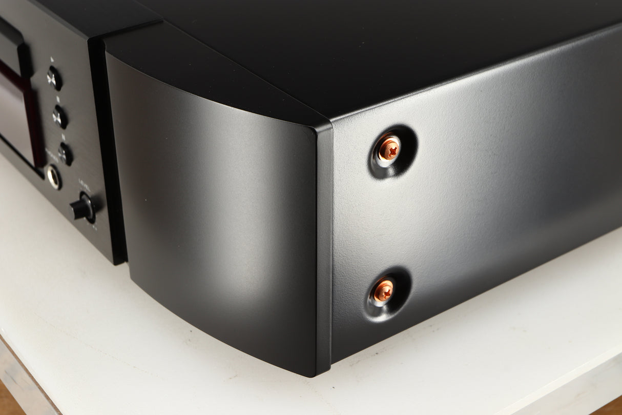 Front right corner of a used Marantz CD6007 CD Player in a black finish