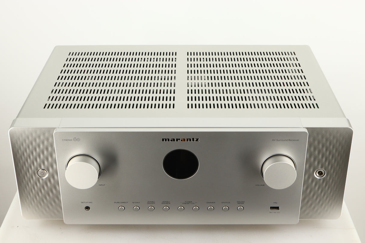 Top of a used Marantz Cinema 60 AV Receiver in a silver finish