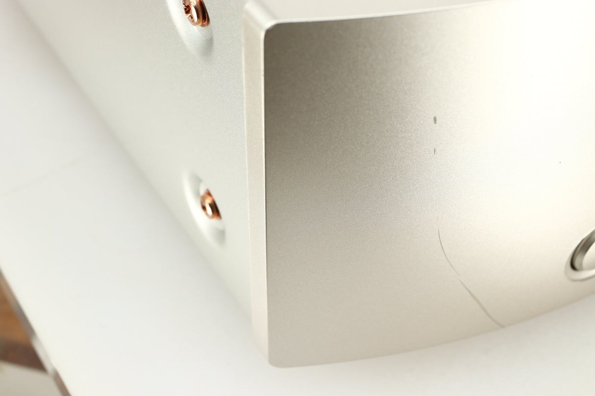 Close up of a used Marantz NA6006 Network Player in a silver finish showing scratch on fascia