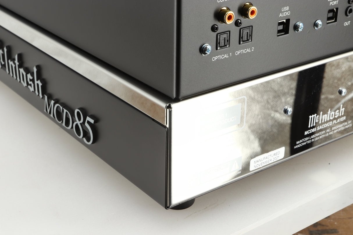 Rear right corner of a used McIntosh MCD85 CD / SACD Player in a silver / black finish
