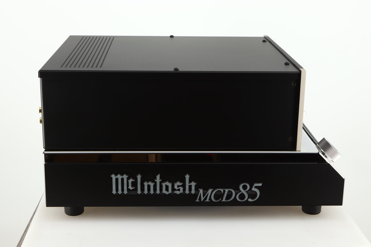 Left side view of a used McIntosh MCD85 CD / SACD Player in a silver / black finish