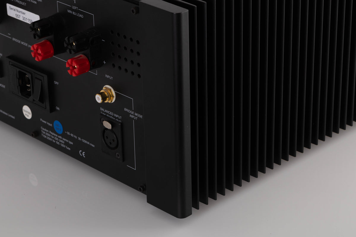 Rear right corner view of a used Meridian 557 Stereo Power Amplifier