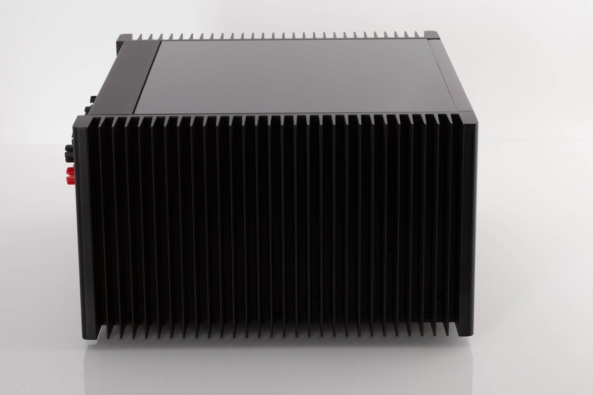 Side view of a used Meridian 557 Stereo Power Amplifier