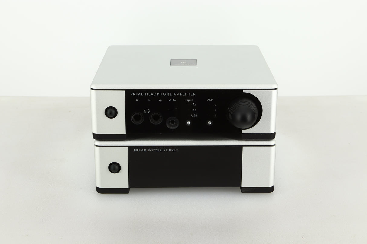 Front view of a used Meridian Prime Headphone Amplifier and Power Supply in silver finish
