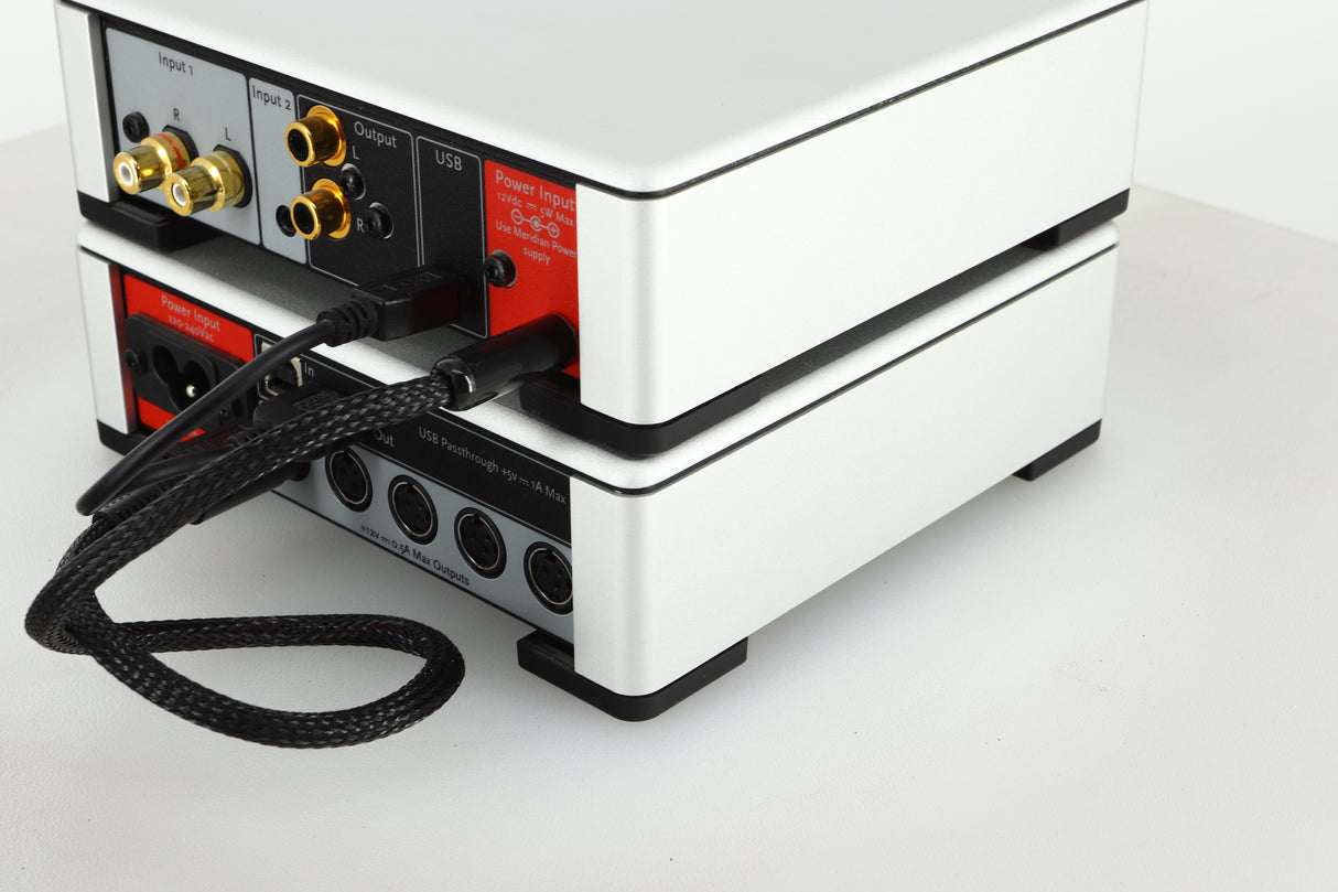 Rear right view of a used Meridian Prime Headphone Amplifier and Power Supply in silver finish