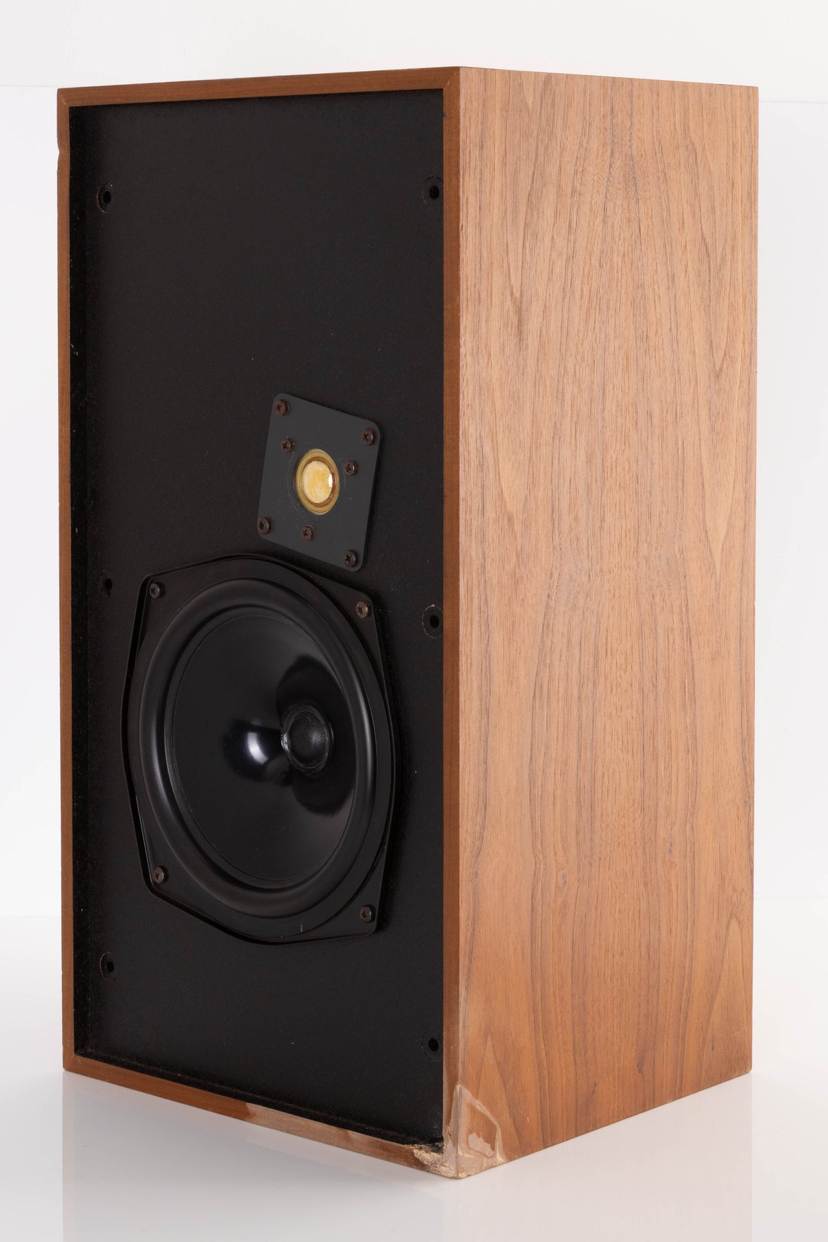 Front right corner of a used Monitor Audio MA5 Series II Standmount Speakers in a Teak finish