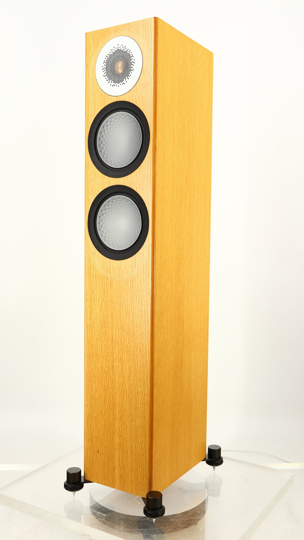 Front right corner of a used Monitor Audio Silver 200 6G Floorstanding Speakers in an oak finish