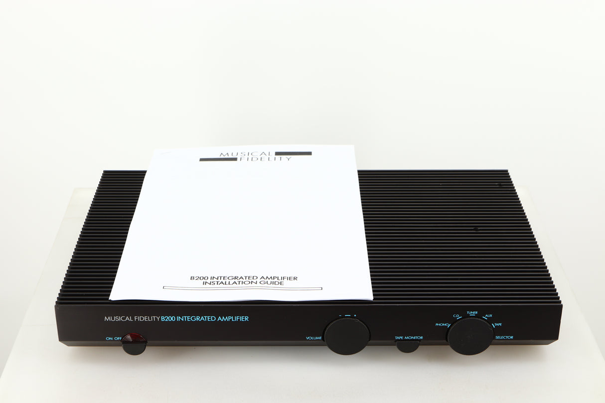 Top of a used Musical Fidelity B200 Integrated Amplifier in a black finish showing Manual