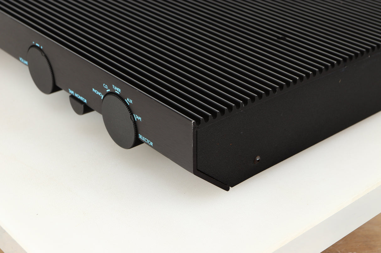 Front right corner of a used Musical Fidelity B200 Integrated Amplifier in a black finish