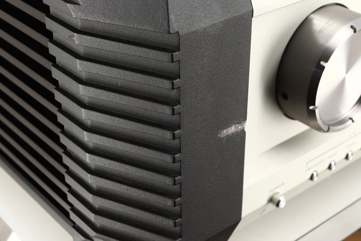 Close up of a used Musical Fidelity KW250S Integrated System showing damage on fascia