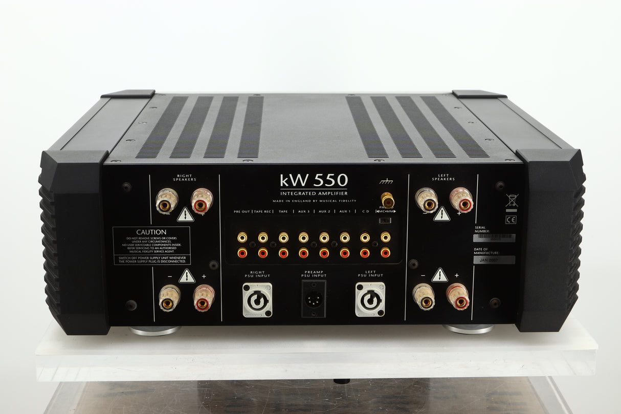 Rear view of a used Musical Fidelity KW550 Integrated Amplifier showing speaker outputs, PSU inputs, and RCA outputs