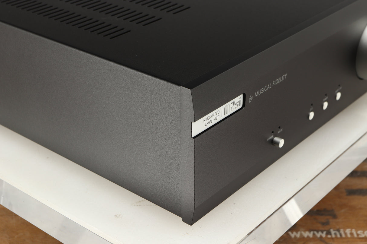 Front left corner of a used Musical Fidelity M2si Integrated Amplifier in a black finish