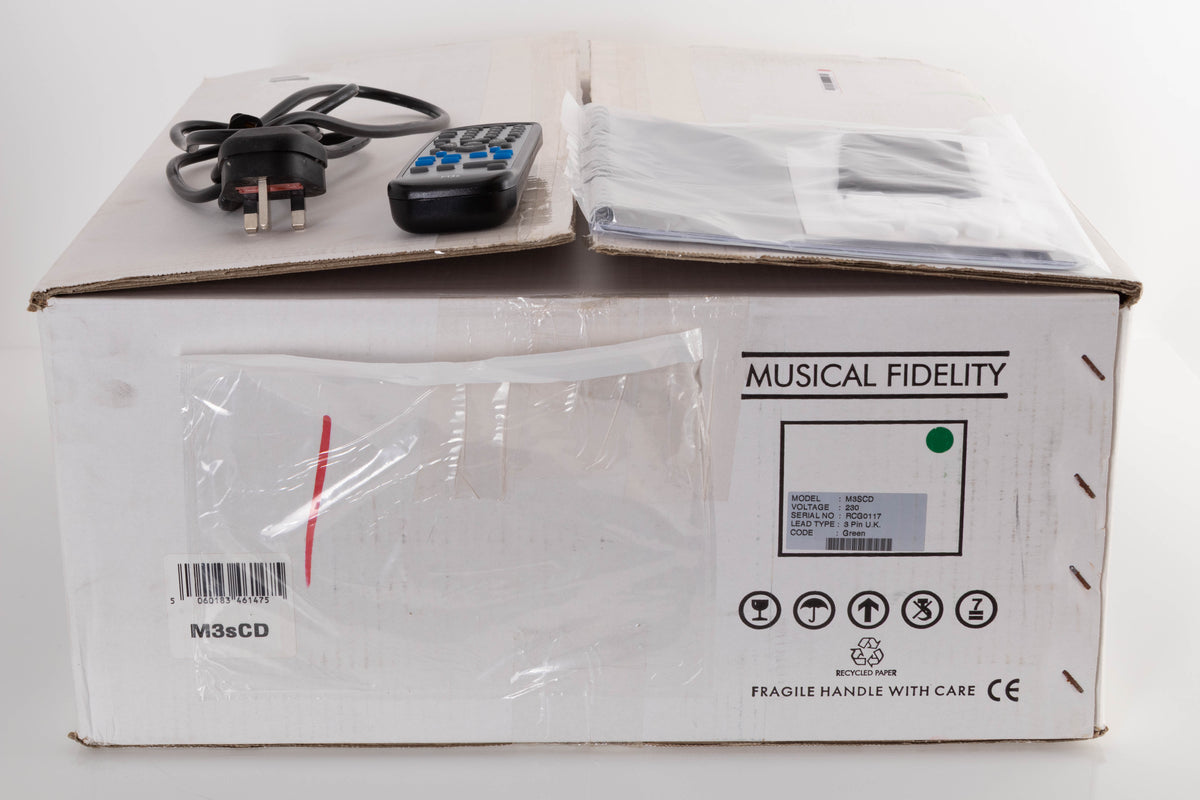 Box of a used Musical Fidelity M3SCD CD Player in Black with mains cable, manual, and remote