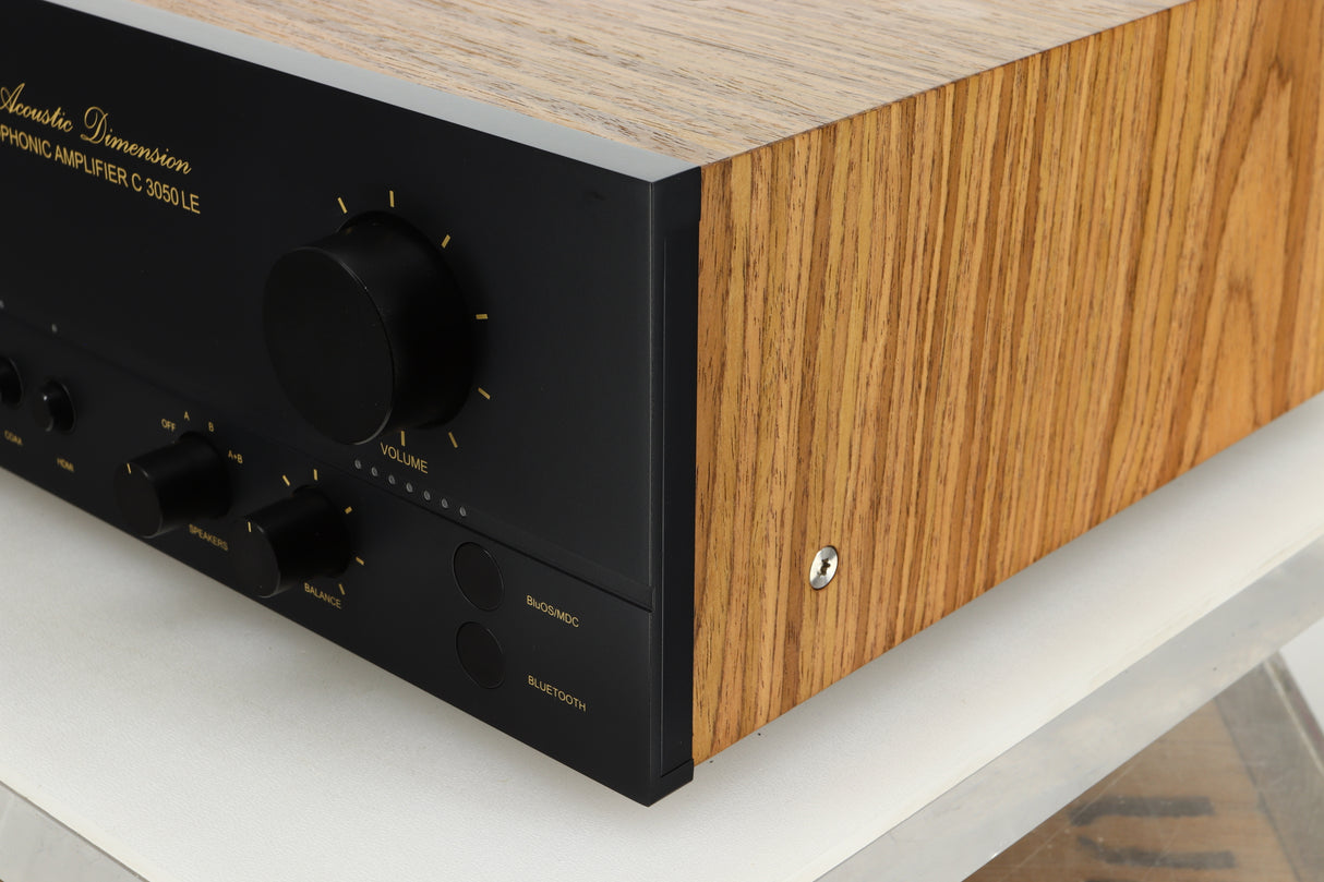 Close up view of the front right corner of a used NAD C3050 LE Integrated Amplifier