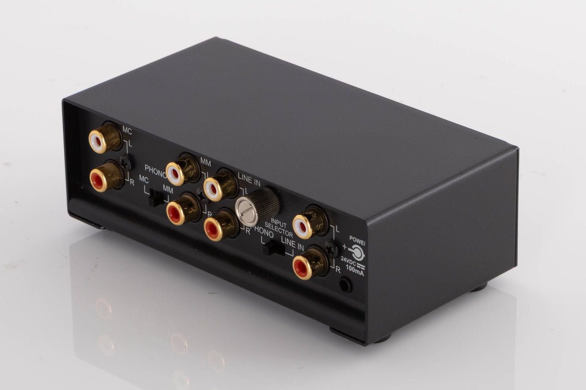 Rear left corner of a used NAD PP3i Phono / USB Pre Amplifier in a Black finish