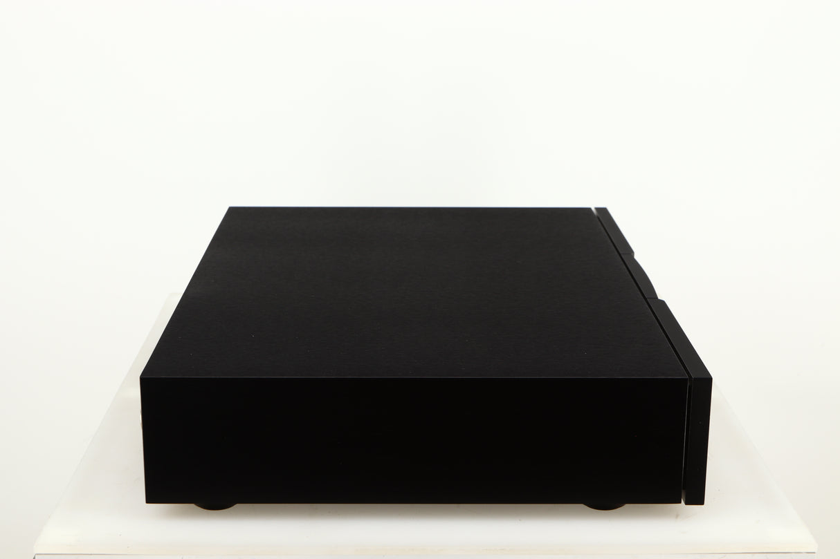 Left side view of a used Naim CD555PS DR Power Supply in a black finish